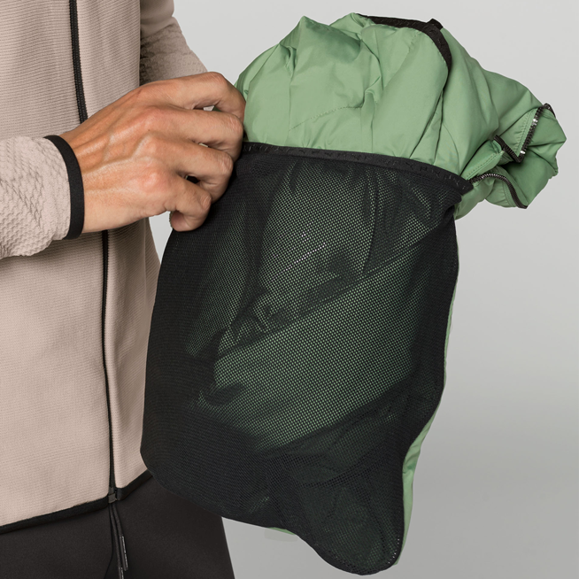 Shows Picture of Green_Packable_Jacket_in_Pocket.png