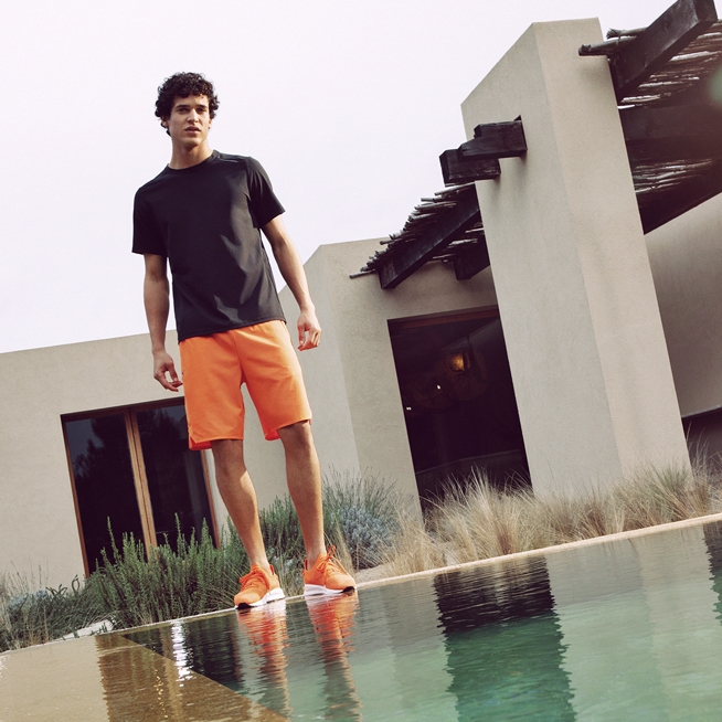 Shows Picture of Orange_Sportpants_Bathing_Shorts_At_Pool.png