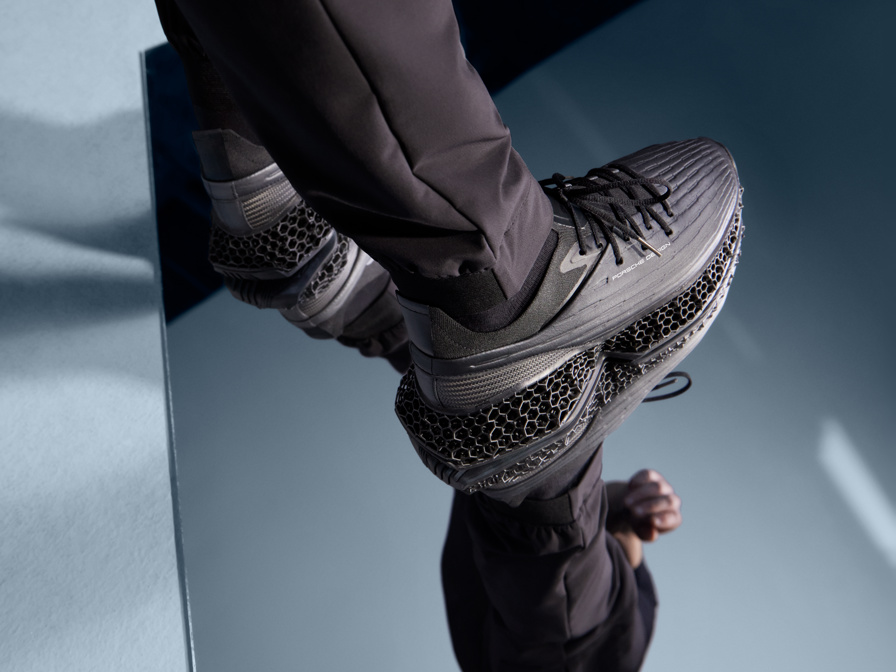 Shows Picture of man-standing-on-mirror-wearing-porsche-design-sneaker.jpg
